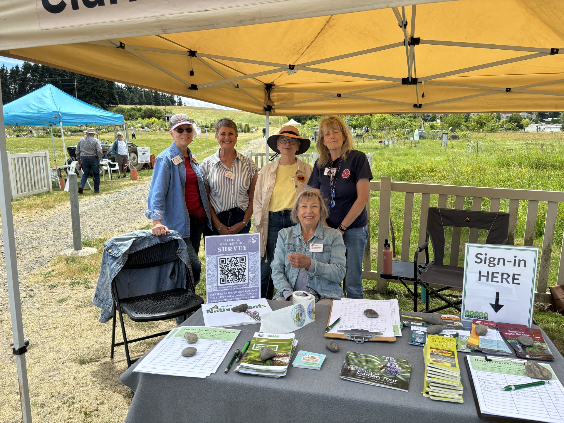 Master gardeners at information table